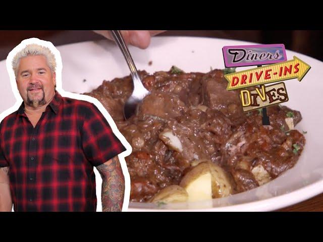 Guy Fieri Eats Irish Guinness Stew in Atlantic Beach | Diners, Drive-Ins and Dives | Food Network