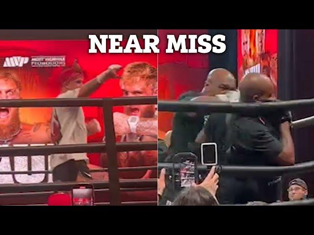 Mike Tyson nearly KNOCKS OUT coach at open workout as Jake Paul begins mind games