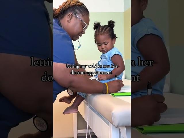 Nurse Listens Intently as Toddler Takes Charge of Own Medical Appointment