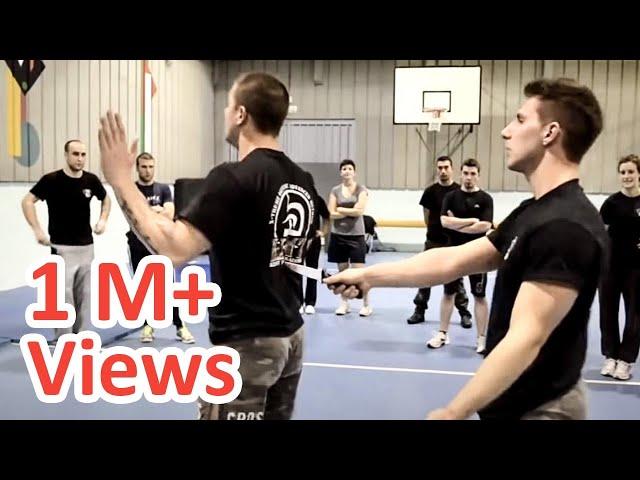 KRAV MAGA TRAINING • How to disarm a knife in your back!