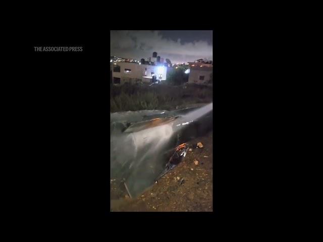 Video shows missile fragments on ground in occupied West Bank, after Iran launches barrage at Israel