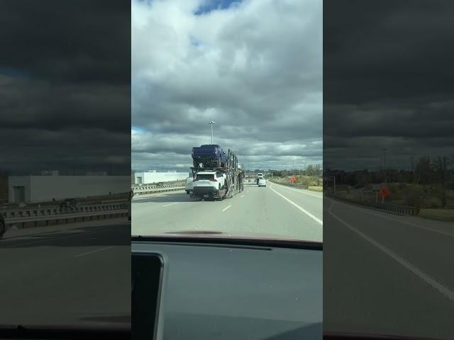 How I captured this truck ferrying cars to the port in the city of Ottawa , Canada.