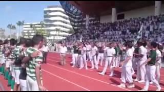 SJI supporters salute their football team