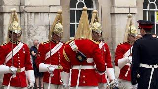 HORSE GUARDS TRY TO STOP LAUGHING AS SENIOR OFFICER INSPECTS THEM!