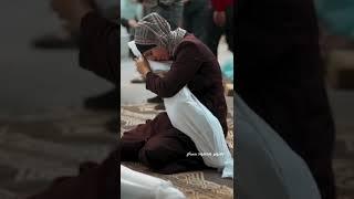 A Palestinian mother giving a last kiss to her dead child October 29th, 2023