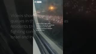 Iran: Thousands of residents flee Tehran as Trump warns 'leave immediately'