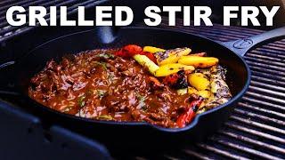 Citrus beef stir fry with grilled peppers