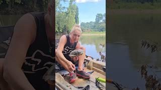 She rescued a red-eared slider on the river.   #kayakfishing #turtles