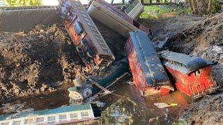 PASSENGER TRAIN CRASHES INTO MUD