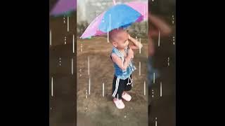 Baby Enjoying the Rain