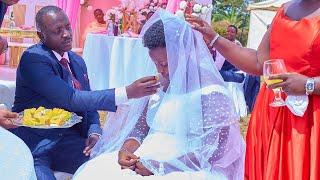 @Bahima Wedding... Joseph Feeds #His_Wife, Molly a Piece of Cake After Vowing in Church