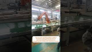 The four-axis handling robot is used in the board cutting production line to assist woodworking
