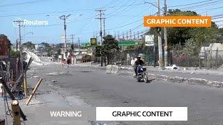 GRAPHIC WARNING: Haiti gangs launch deadly attack on capital's Delmas neighborhood | REUTERS