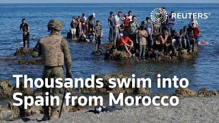 Thousands of migrants reach Spain from Morocco