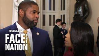 Rep. Byron Donalds reacts to House Speaker Mike Johnson's remarks after reelection