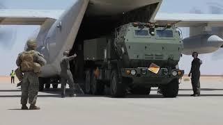 U.S. Marines with Hotel Battery, 2nd Battalion, 10th Marines, 2d Marine Division, execute a HIMARS