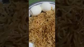 Indomie Fried Noodles and Boiled Eggs