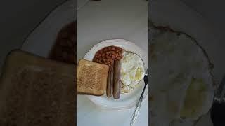 Breakfast. Sausage, Eggs. Toast and Baked Beans. Enjoy.  @bluesky2019