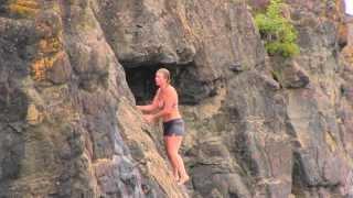 Wild Woman Kellie Nightlinger rock climbs after cliff jump and 1 of her youth campers follows