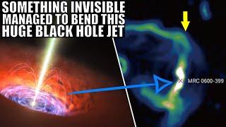 Something Invisible Bent This Black Hole Jet by 90 Degrees