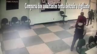 Vigilante reage assalto em banco manda 2 pro saco