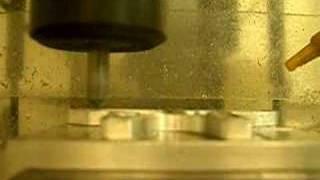 burring of alloy with Optimill BF-46 CNC mill