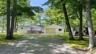 7426 PARADISE TRAIL, CARP LAKE, MI Presented by Lynn Robinson.