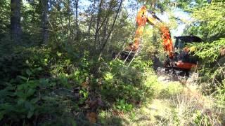 Defender Forestry Mulcher by BrushHound Attachments