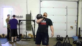 Chris Mathison Pressing a 150lb Kettlebell Twice