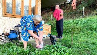 Happy old age of an elderly couple in a Ukrainian mountain village