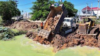 Amazing video project shows how to fill a large pond By Dozer Komatsu D50P Strong with Dozer mini