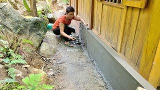 Build and complete cement brick walls to prevent flood water from entering the house