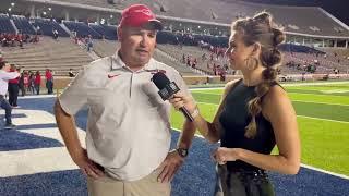 Taylor Arenz talks with North Shore’s Coach Jon Kay after victory against Westlake.