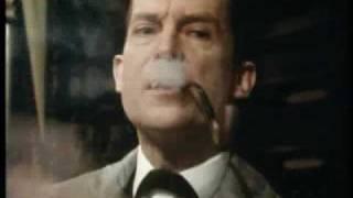 Sherlock Holmes Lights A Fire