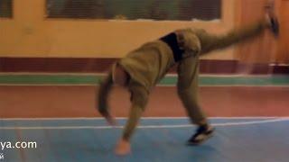 Acrobatics. Stick driving. Plastoon martial art, fighting system of Leonid Polezhaev.