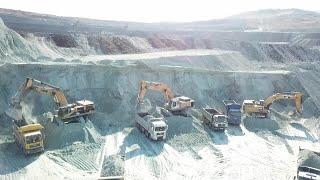 Caterpillar And Liebherr Excavators Loading Trucks On The Line - Aerial Video - Ascon Ltd