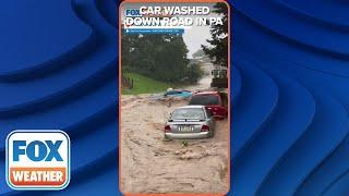 Car Washes Down The Road During Intense Flooding In Reading, PA