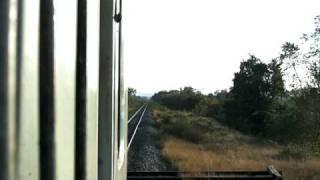 Crossing the Lam Narai rail bridge.