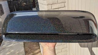 Subaru hood scoop wrapped in Oracal 970RA Black galactic gold vinyl wrap before and after.