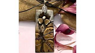 Take a break with Clayboutique! Polymer Clay Aged Metal Flower Pendant