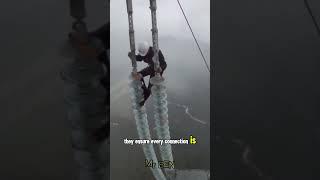 "High Voltage Heroes! Power Line Workers at Extreme Heights"#videoviral#videoshort#mrben