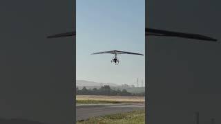 Electric hang glider landing at Petaluma airport CA