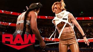 Becky Lynch "drops" the Raw Women's Championship at Bianca Belair's feet