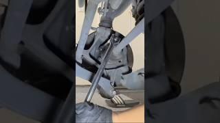 Using a breaker bar to remove the 4 bolts holding the rear wheel bearing on my Subaru #diy #subaru