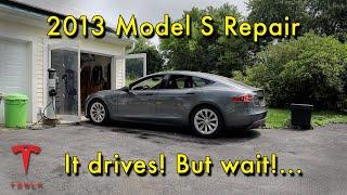 Tesla Repair - Out of the garage! Off the blocks, plus window repair