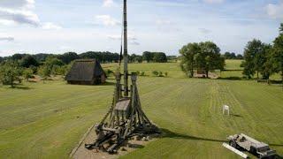 Unleashing a Medieval Trebuchet on a Wooden Palisade