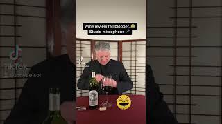 Microphone  wine review fail blooper. 