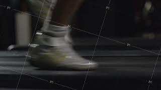 Man running in a modern gym on a treadmill concept for exercising, fitness and healthy lifestyle