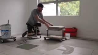 Racatac in Action laying tiles