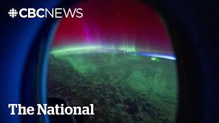 #TheMoment an astronaut captured dancing northern lights from space